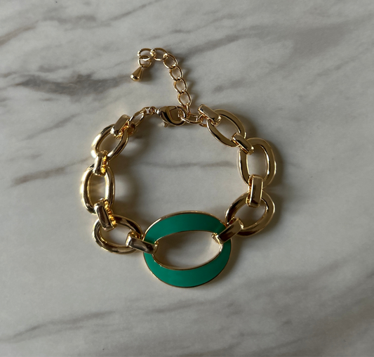 Gold plated bracelet with green design